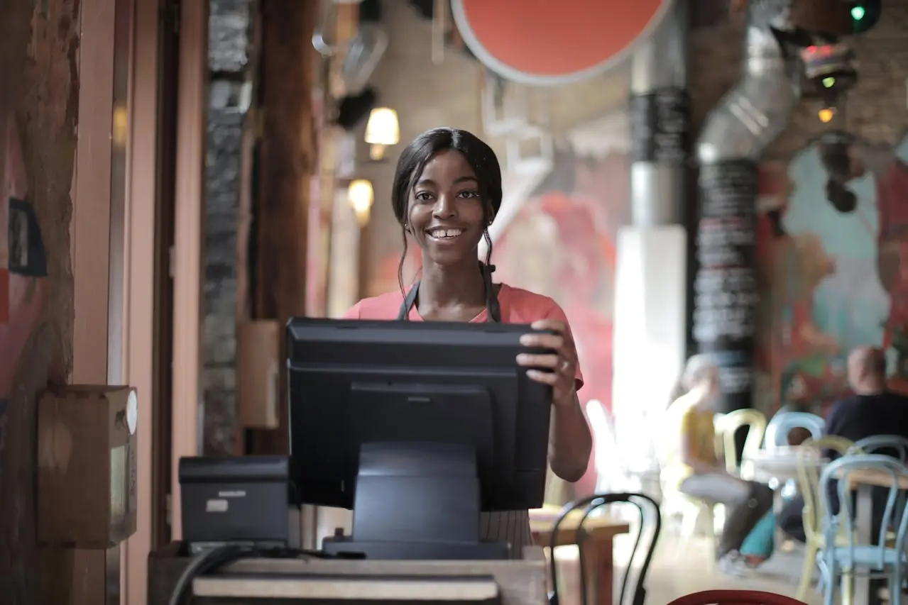 Customer service sales clerk worker standing-at-counter