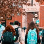 Think Big Postgraduate Scholarship students walking to school with their bags