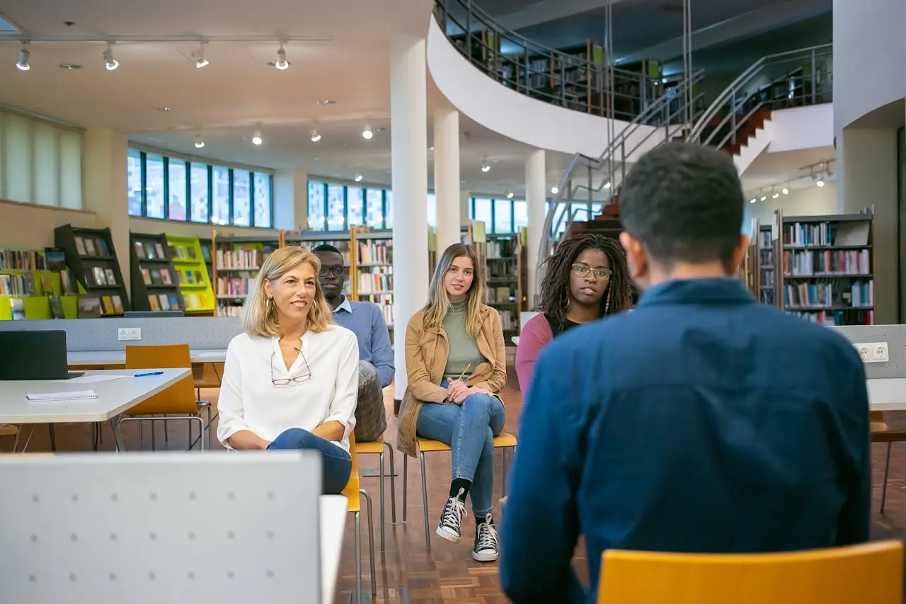 World Bank's Robert S. McNamara Fellowships multiethnic-students-and-teacher-listening-report-of-student