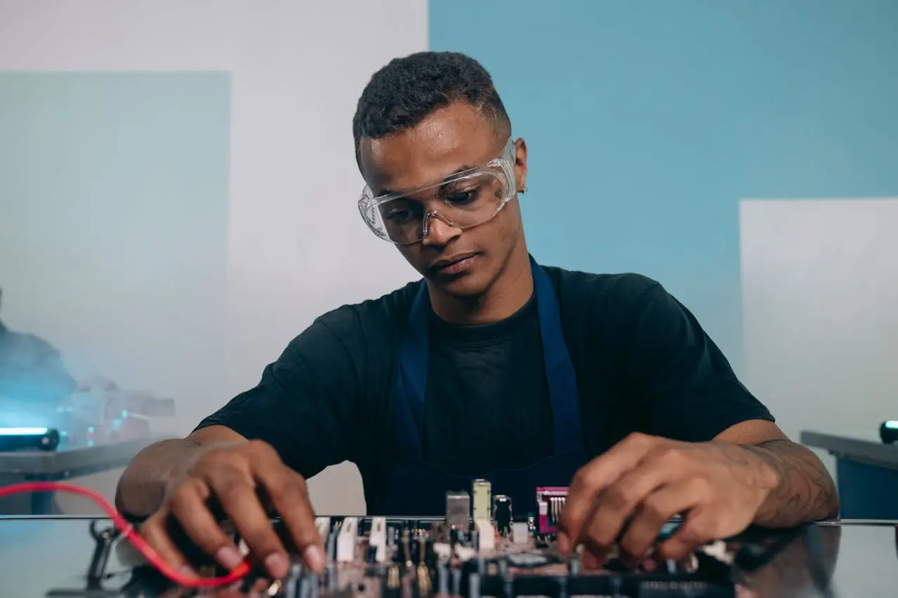 an instructional lab coordinator-working-on-a-circuit-board