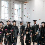 world bank graduate scholarship photo-of-fresh-graduates-celebrating-in-gym