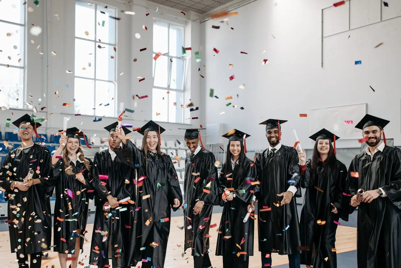 world bank graduate scholarship photo-of-fresh-graduates-celebrating-in-gym