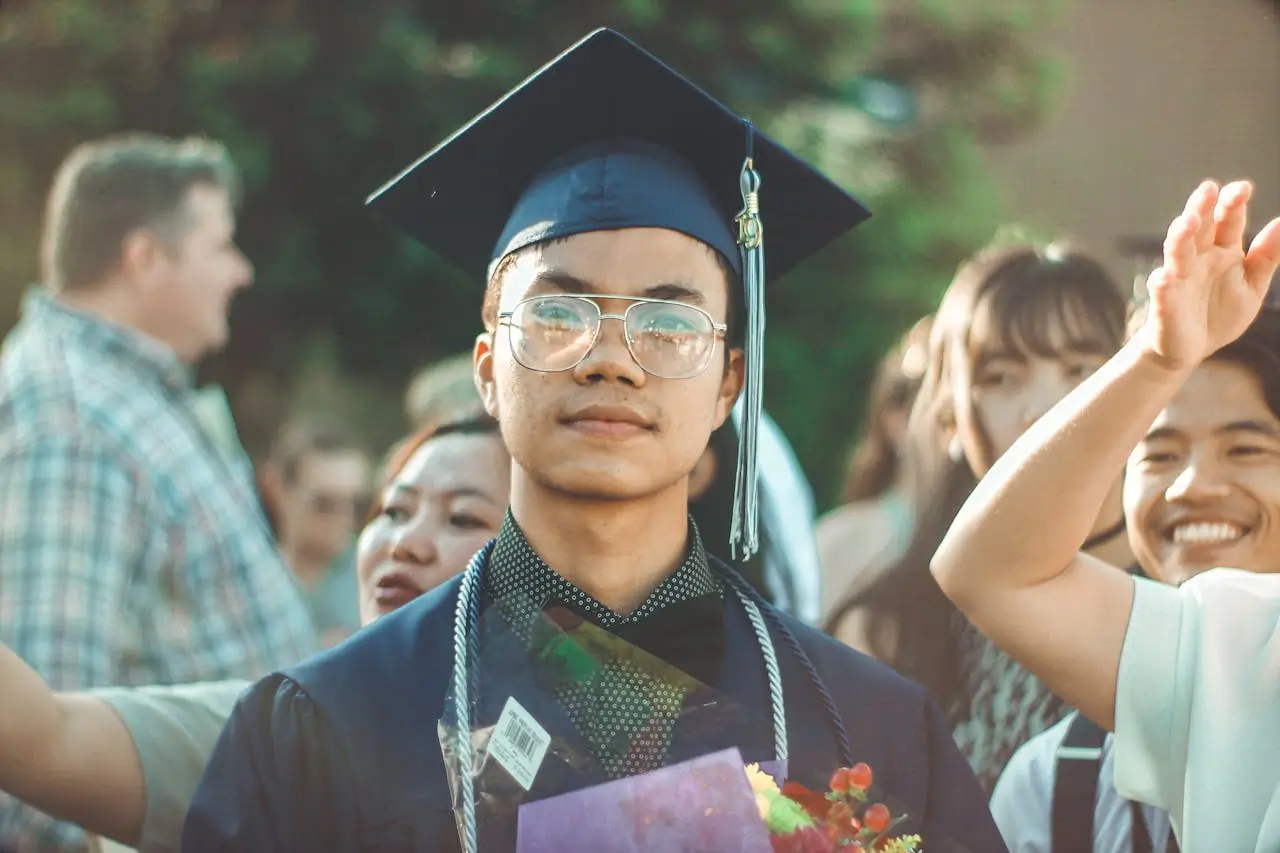 International postgraduate scholarships man-wearing-academic-dress