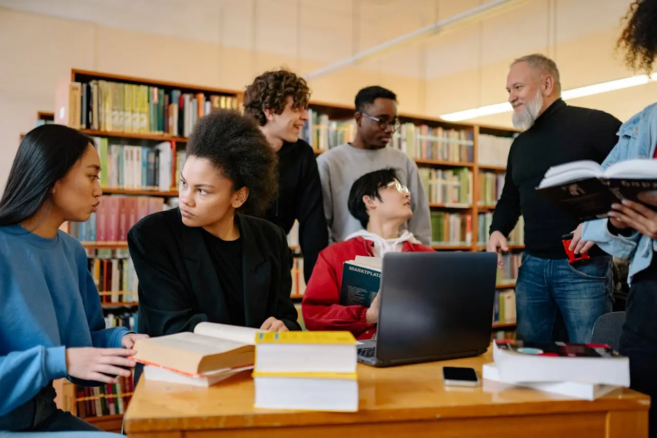 UdeM Exemption International Scholarship group-of-people-sitting-on-chair-in-front-of-table